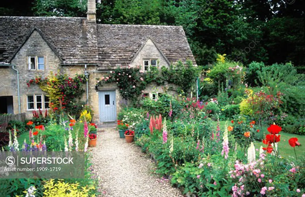 Bibury Cotswolds english cottage garden in summer Gloucestershire England UK Great Britain United Kingdom British Isles
