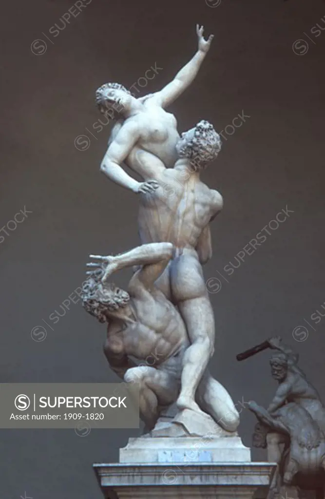 Florence The Rape of the Sabine sculpture carved from a single block of marble by Giambologna in 1583 The Loggia of the Lanzi Piazza della Signoria Florence Tuscany Italy Europe