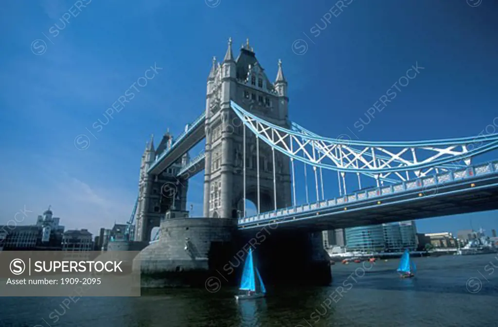 Tower Bridge with the statue of Girl Playing with Dolphin by David Wynne London England United Kingdom UK Great Britain GB Europe
