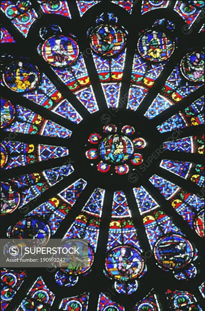 Notre Dame Cathedral showing interior and detail of the stained glass rose window in the north transcept Paris France Europe