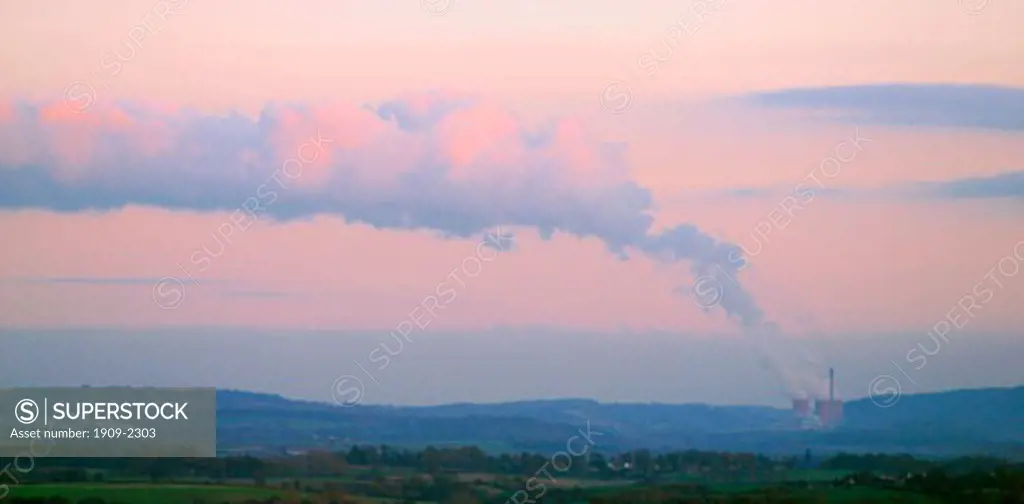 Shropshire Ironbridge Power Station with steam rising to merge with sunlit evening clouds from the cooling towers of the coal burning power station in Shropshire England UK GB Great Britain United Kingdom British Isles Europe EU