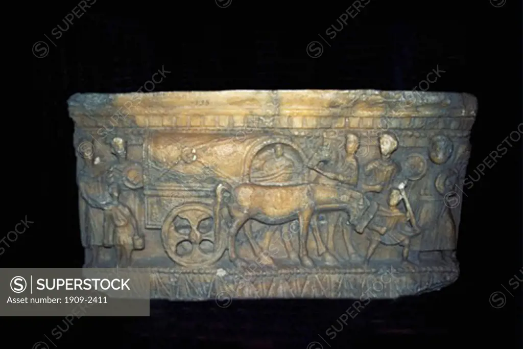 This Etruscan funerary urn showing horses drawing a covered waggon is thought to be transport for the funeral procession It is in the Museo Etrusco Guarnacci The Etruscan archeological museum in Volterra Tuscany Italy Europe EU