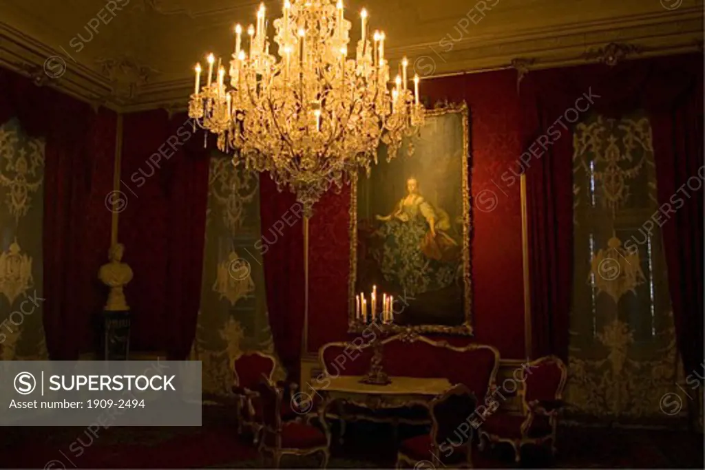Portrait of Marie Antoinette with chandalier and furniture interior of Schonbrunn Palace Vienna Austria Europe EU