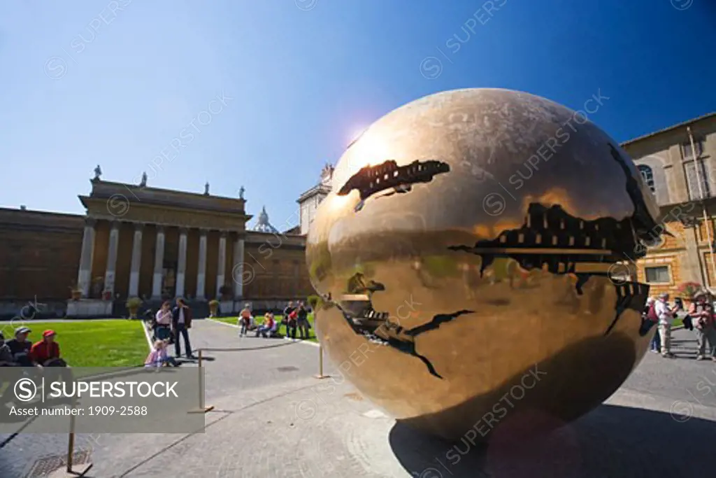 Sculpture of the globe in the inner courtyard of the Vatican in bright summer sun sunshine Vatican Museum Musei Vaticani Rome Italy Italia