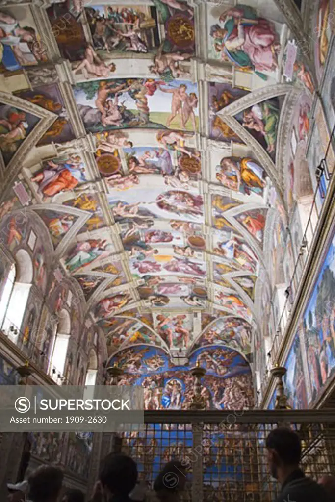 Sistine Chapel tourists admire ceiling frescoes by Michelangelo Vatican Museum Rome Italy Europe EU