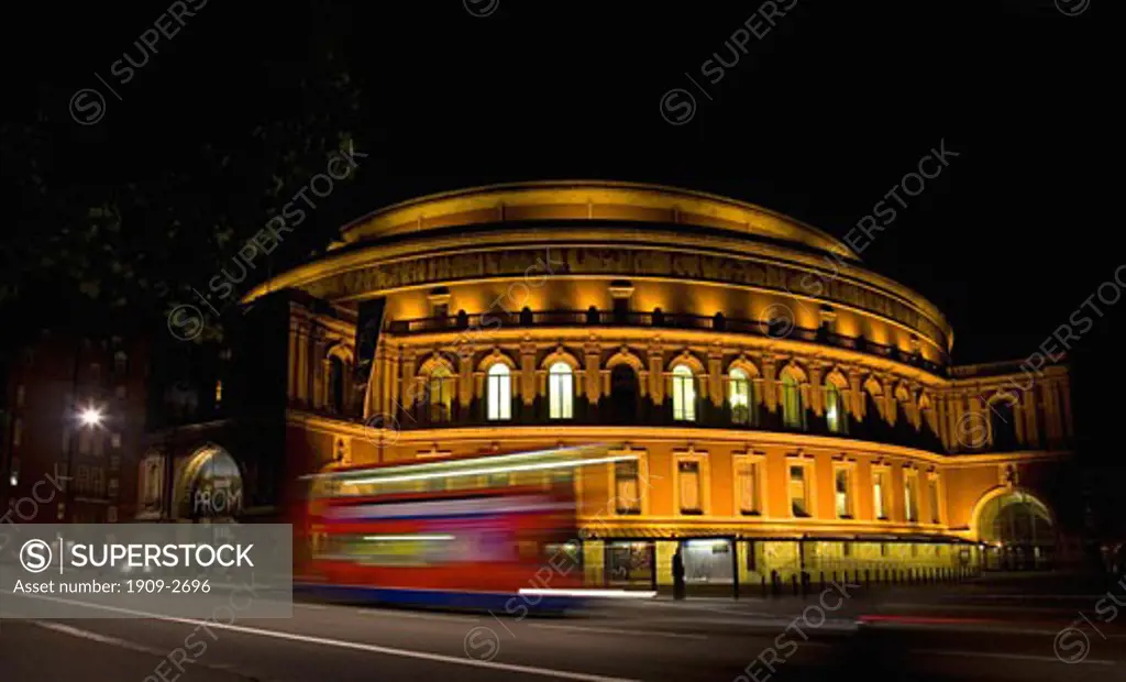 Royal Albert Hall  in evening with red double decker double-decker bus at night nighttime London England UK United Kingdom GB Great Britain British Isles Europe EU