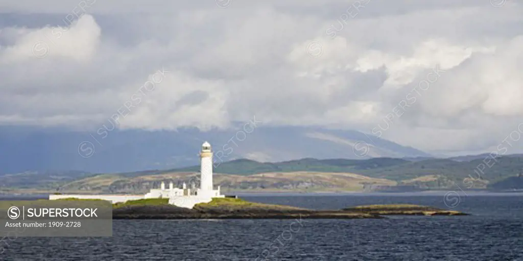 Sound of Mull with Lismore Lighthouse taken from ferry between Oban and Mull Inner Hebrides Argyll Scotland UK United Kingdom GB Great Britain British Isles Europe EU