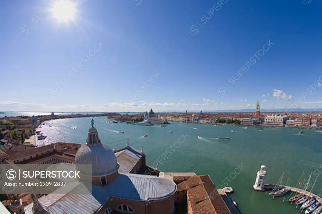 Guidecca canal and Venice waterfront from Campanile Belltower of San Giorgio Maggiore church in summer sun sunshine Veneto Italy Europe EU