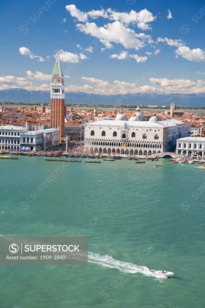 Venice waterfront panorama on sunny summers day with Doges Palace and Campanile with blue sky and white clouds taken from belltower of San Giorgio Maggiore Veneto Italy Europe EU