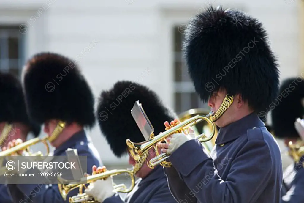 Trumpet trumpeters of the Coldstream Guards band playing music at the changing the guard at Buckingham Palace London England Great Britain GB United Kingdom UK British Isles