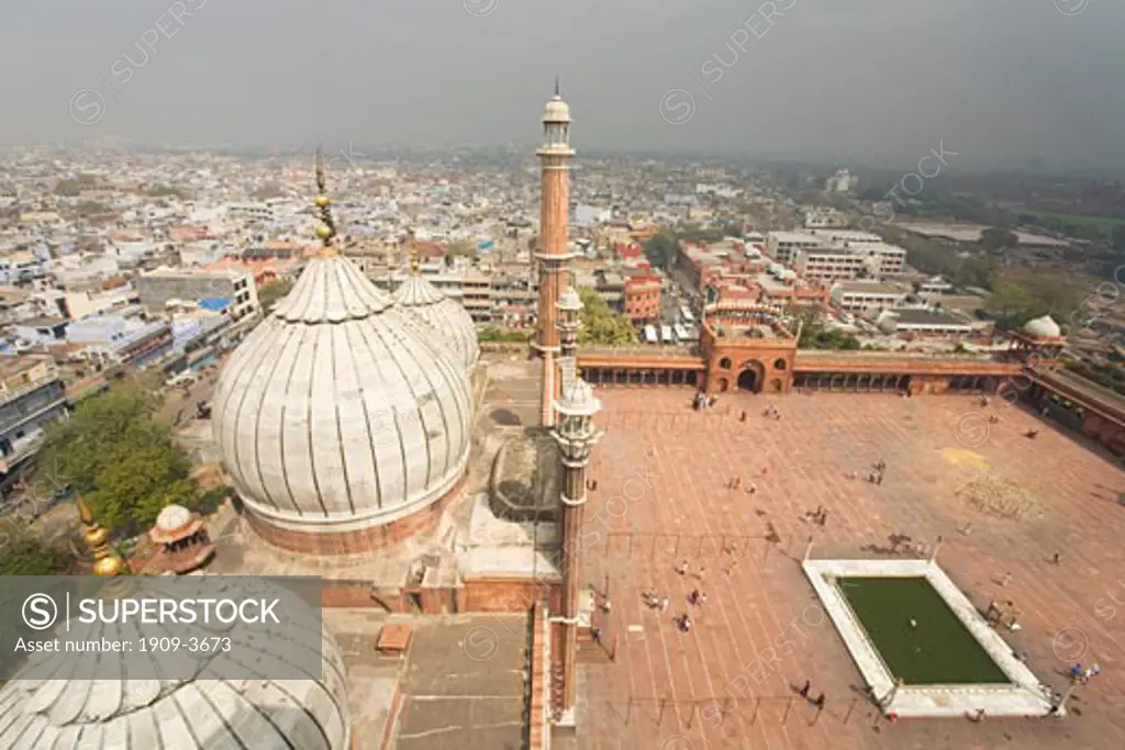 Aerial view of main courtyard taken from minaret showing domes of the Jami Masjid Mosque built in 1656 by Emperor Shah Jahan in Delhi Uttar Pradesh India Asia