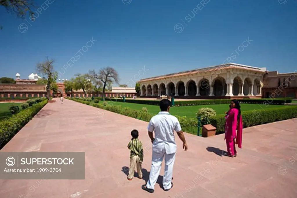 Indian family visiting the Marble Diwan-i-am Palace inside the Red Fort complex a UNESCO World Heritage site in Agra Uttar Pradesh India Asia