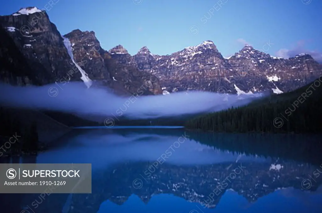 Moraine Lake in the Valley of the Ten Peaks Banff Natl Park This lake is one of Banffs most famous icons and attracts thousands of tourists to  its shores every year CANADA Alberta