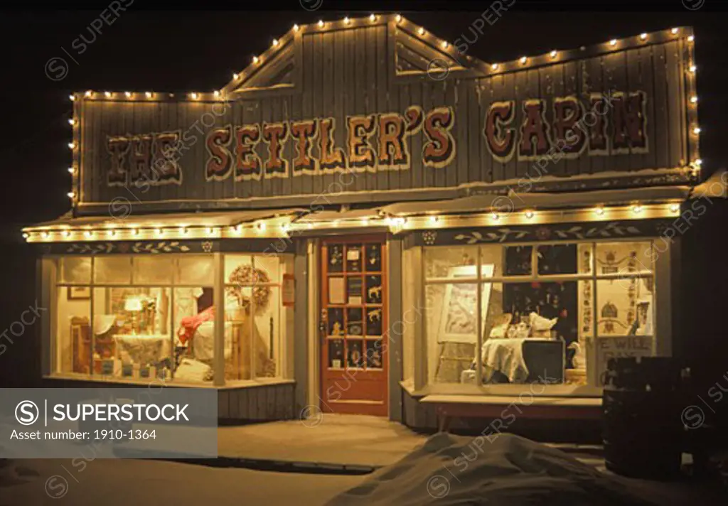 Settlers Cabinstore in Canmore during winter evening CANADA Alberta