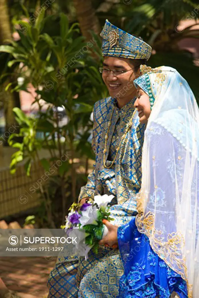 young couple in wedding clothes  Malacca  Historic Melaka   Malaysia Peninsula  Malaysia  SE Asia