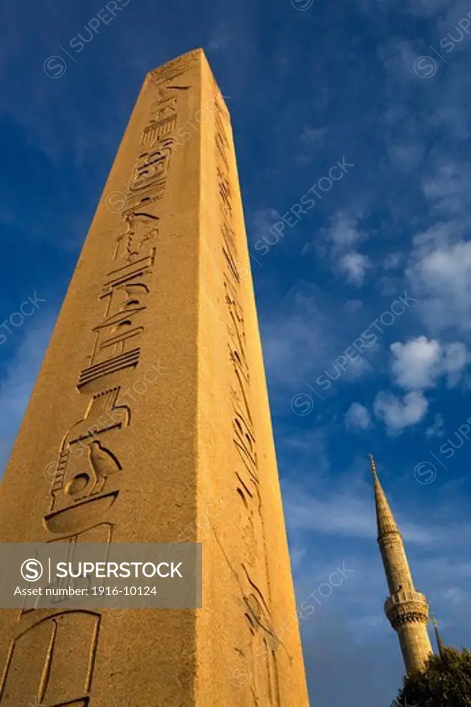 Obelisk of Theodosius in the Hippodrome of Constantinople and minaret of Blue Mosque (Sultan Ahmet mosque), Istanbul, Turkey