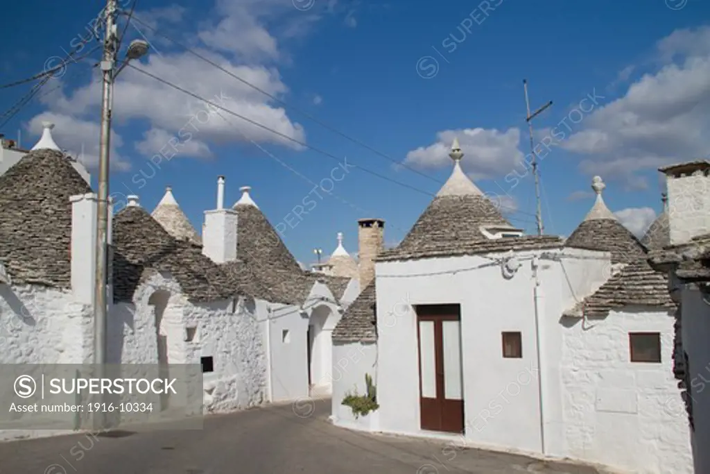 Trulli (traditional) limestone houses with conical stone roofs, many still used as private homes,  form a part of a UNESCO World Heritage site.Alberobello,Puglia,Italy