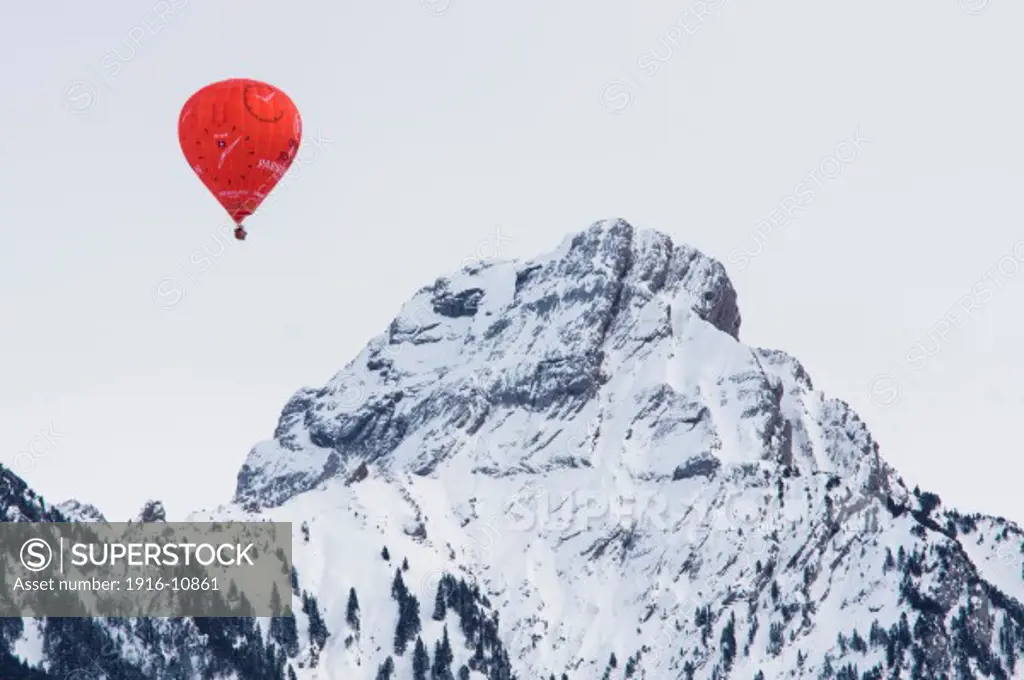 Parmigiani's balloon over Swiss Alps. Chateau d'Oex, Switzerland