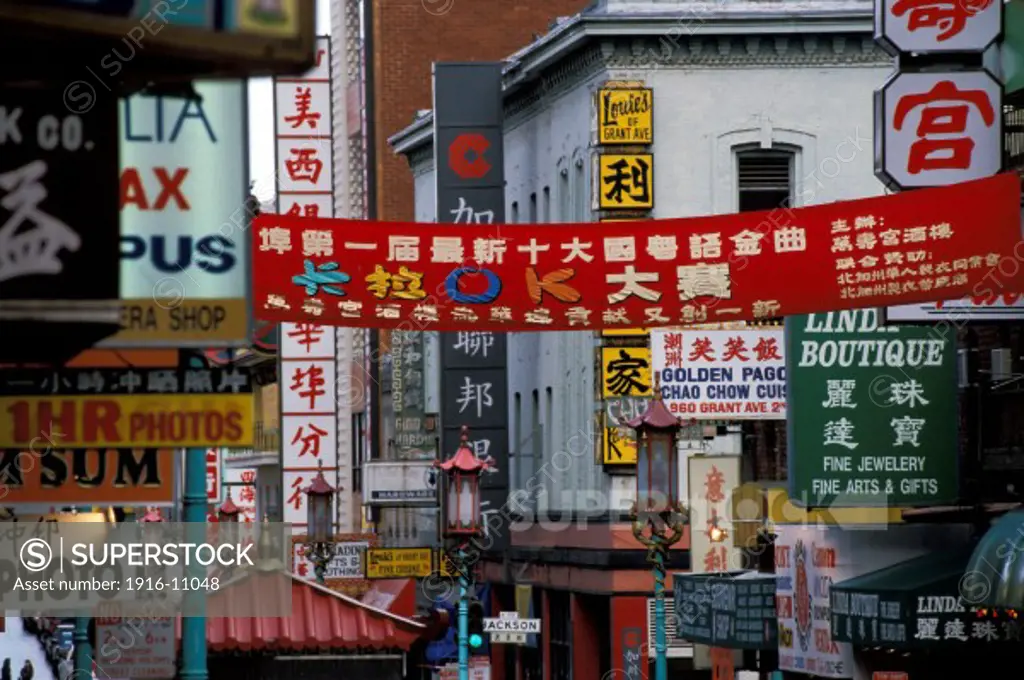 Signs and banners in Chinatown on Grant Avenue at Jackson, San Francisco, California