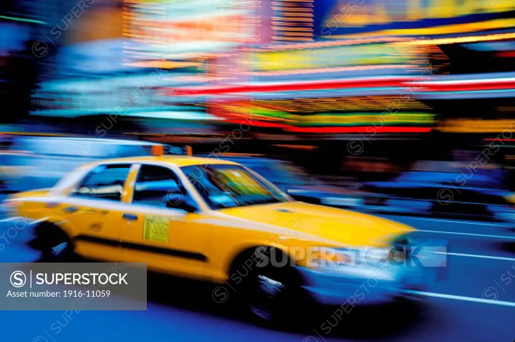 Taxi cab in Times Square, New York City, New York, blurred motion