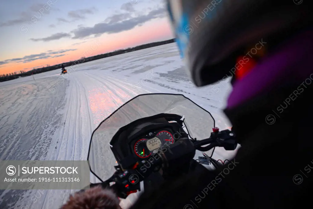 Snowmobile sunset tour with Arctic Lifestyle, Rovaniemi, Lapland, Finland.