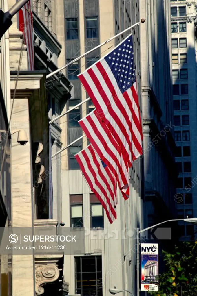 USA flags at the New York Stock Exchange Building on Nassau Street, New York NY