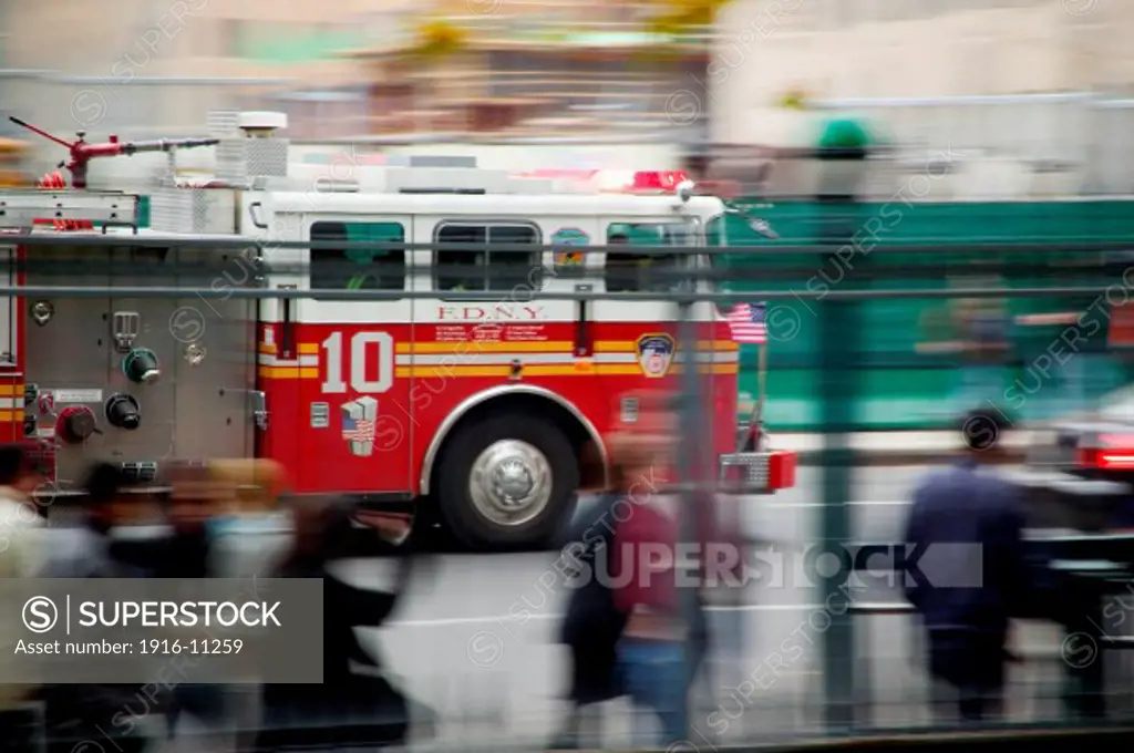 FDNY Engine and Ladder company 10 fire truck on way to emergency call, New York, NY