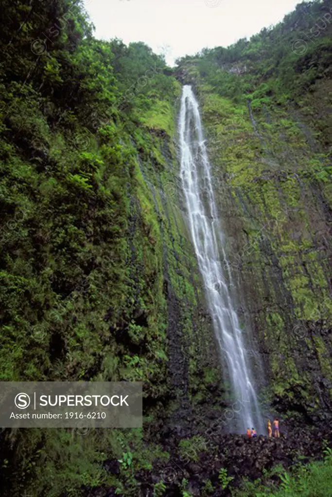 Hawaii, Maui, Haleakala National Park, Oheo Gorge, People at base of Waimoku Falls