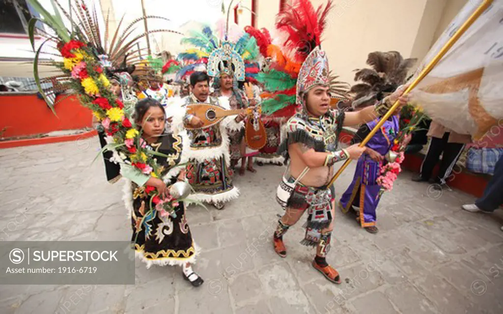 Mexico, Edo de Mexico, Temascalcingo, Aztec dance performed in New Years eve in San Miguel Arcangel temple