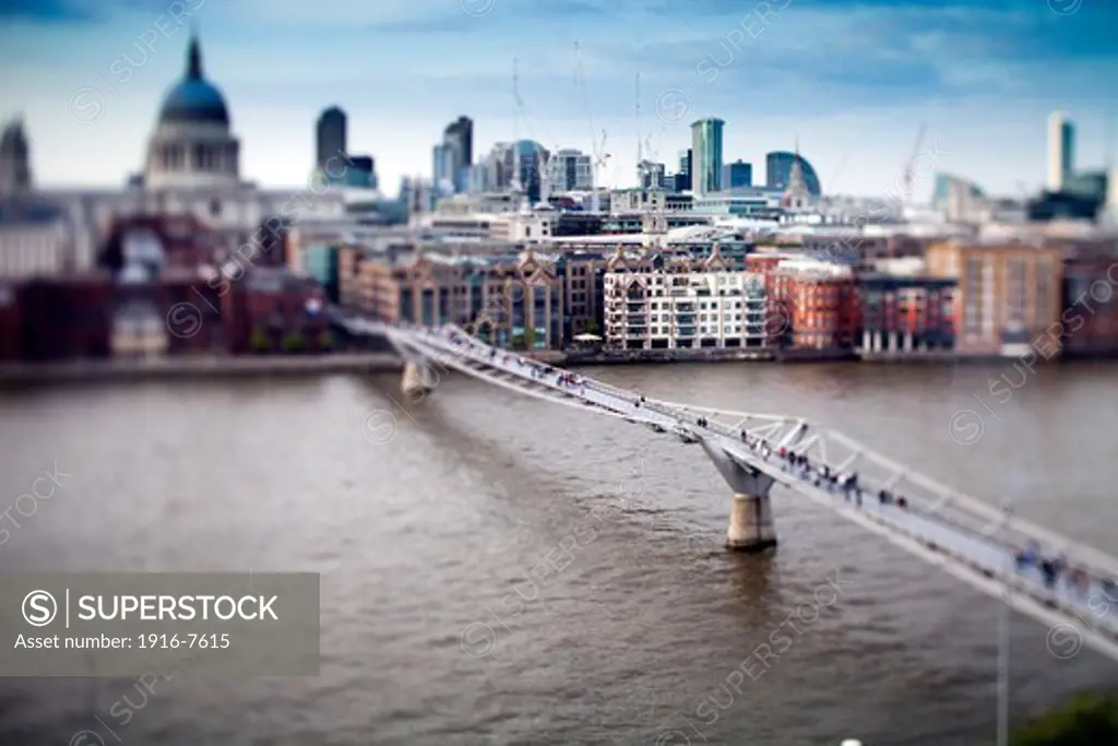 United Kingdom, England, London, Millennium Bridge over Thames and St Paul cathedral in background,
