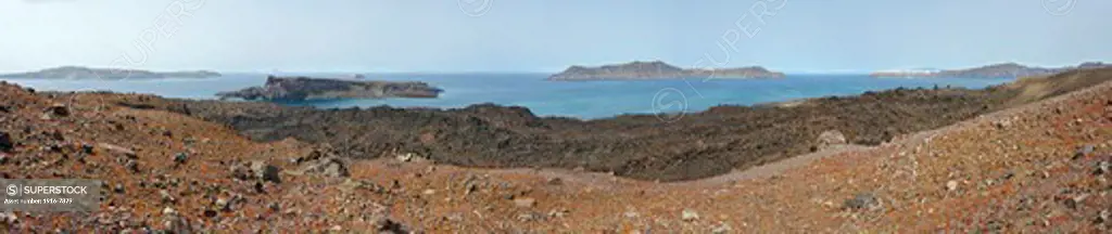 Palea Kameni and Aspronisi and Therasia islands with Oia in the right side from Nea Kameni Island, Santorini, Greece