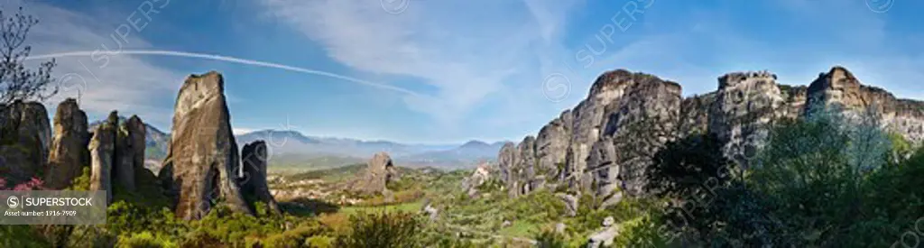 Greece, Kastraki, Panoramic view of sandstone rock pillars in Meteora, Holy Monastery of St. Nicholas Anapausas on middle and Holy Monastery of Varlaam on right