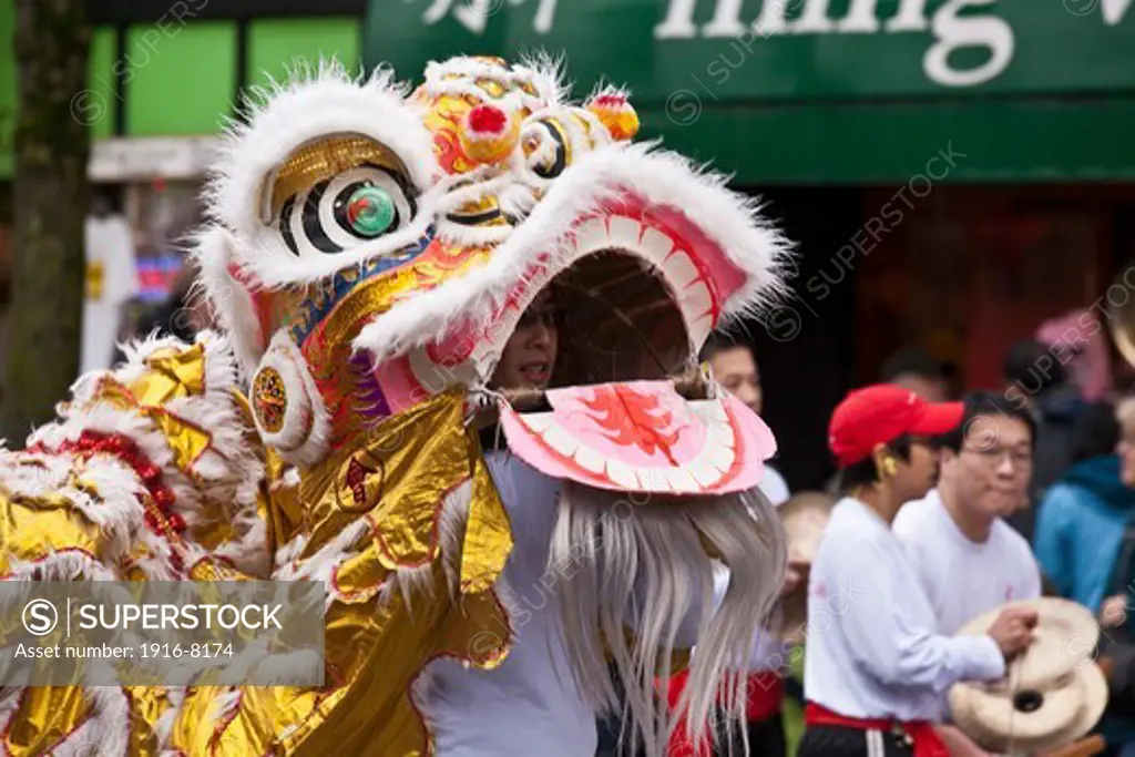 Lion dancer. Chinese new year Celebration. Chinatown, Vancouver, British Columbia, Canada