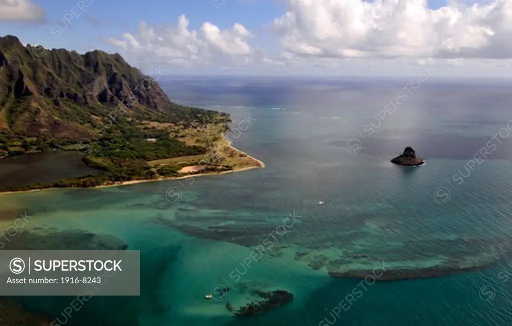 Aerial view of Kualoa mountains and Chinaman's Hat island in Kaneohe Bay, windward Oahu, Hawaii, USA