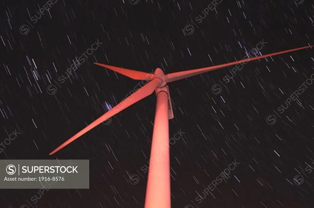 Wind farm at night.