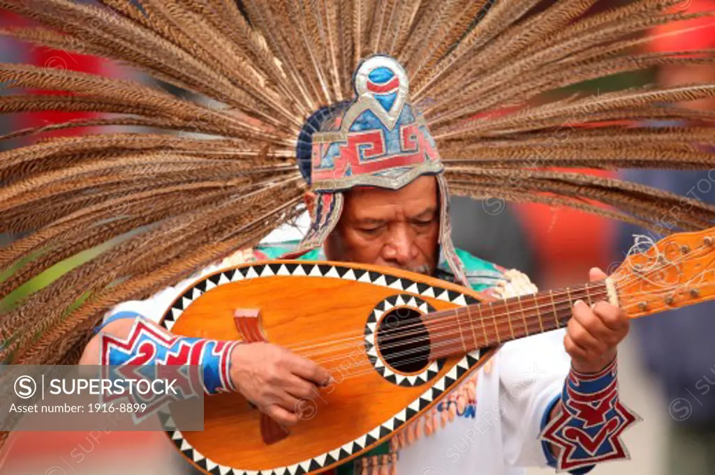 Aztec dance performed in New Years eve in San Miguel Arcangel temple.