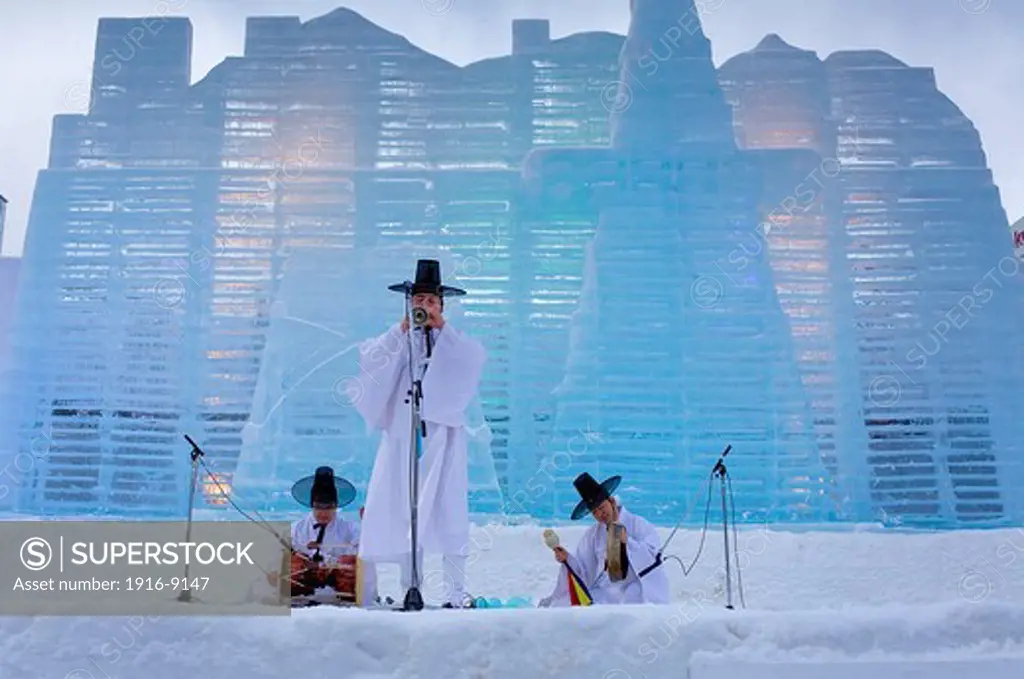 performance,Sapporo snow festival,in background ice sculpture,Odori Park, Sapporo, Hokkaido, Japan