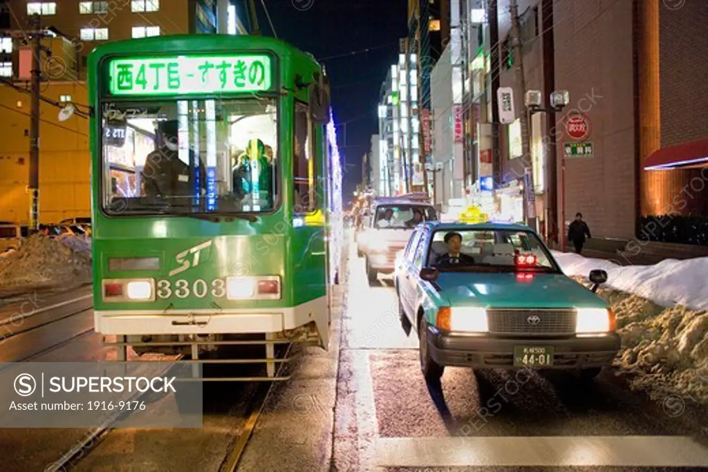 Tram and taxi in Minami Ichijo Avenue,Sapporo, Hokkaido, Japan