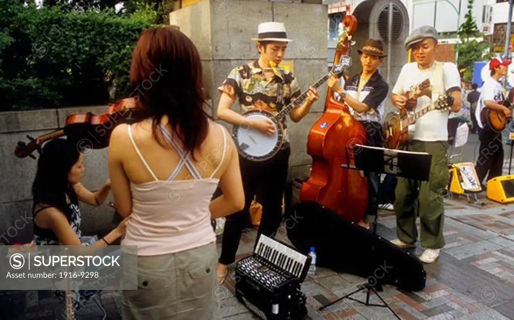 Harajuku bridge.Street, musicians.Tokyo city, Japan, Asia