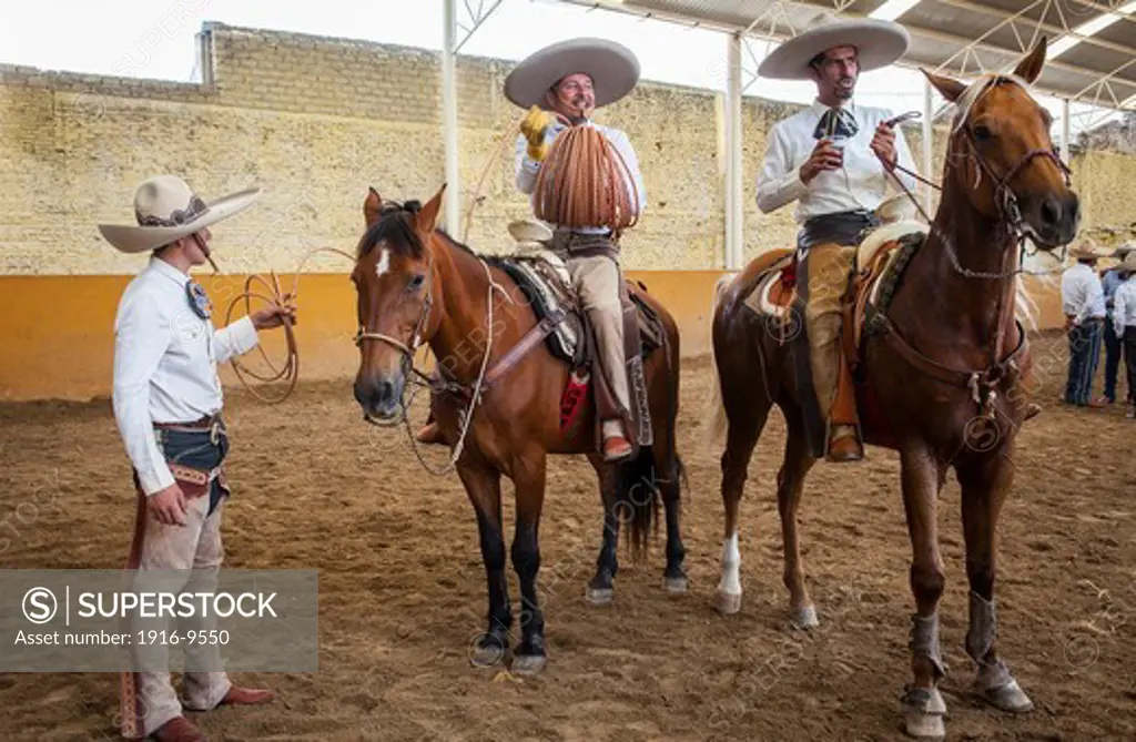 Mexican charros. A charreada Mexican rodeo at the Lienzo Charro Zermeno, Guadalajara, Jalisco, Mexico