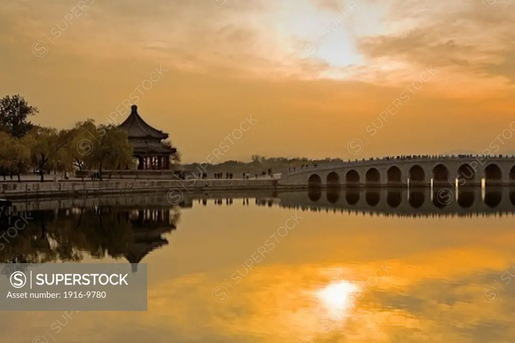 Summer Palace, in lake Kunming. At right Seventeen arch bridge,Beijing, China