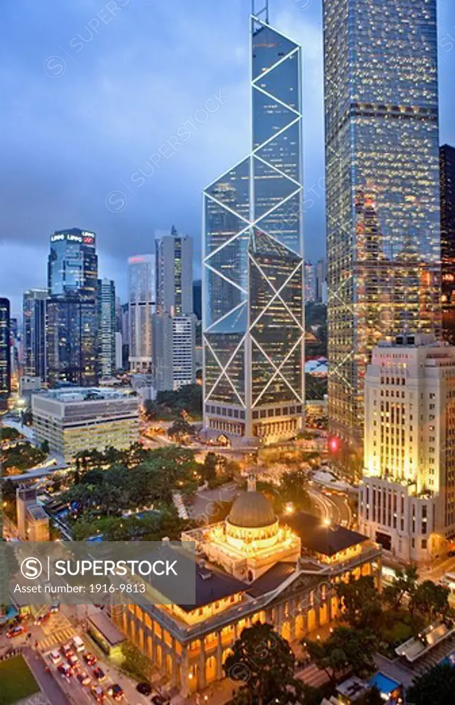 Statue square. Legislative Council Building ( Old Supreme Court), construction 1912, and Charter Garden. In background  Bank of China Tower on center, Cheung Kong Center at  right and Lippo tower at left,Hong Kong, China