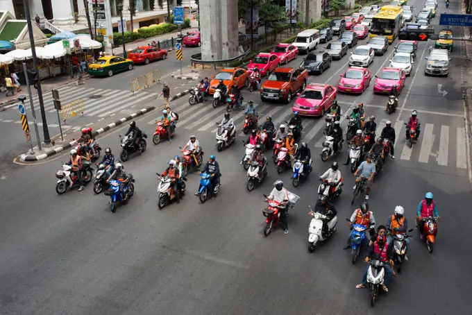 Traffic in Bangkok Near MBK Centre Thailand South East Asia. Motorbikes are ubiquitous in Thailand, but helmets are not. Activists aim to tackle a problem that claims thousands of lives. Thailand ranks worst in the world for motorbike and two-wheeler casualties, with more than 11,000 motorbike drivers or passengers dying annually. Official statistics suggest such incidents account for 70% of the country's road fatalities. Many die because they don't wear a helmet. According to a Motorcycle Safet