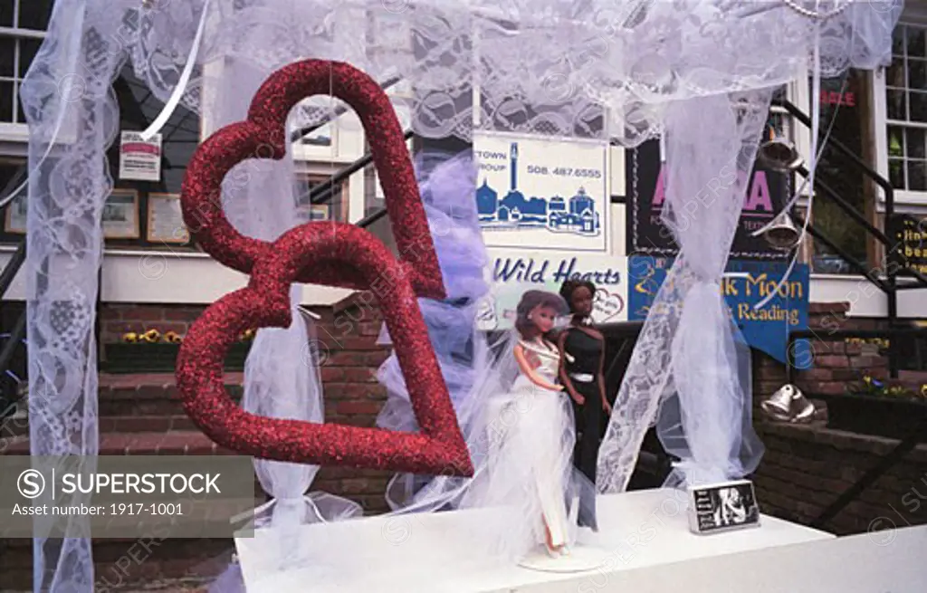 In Massachusetts Gay couples are now allowed to marry  In Provincetown on Monday May 17 2004  a display in front of a store on Commercial Street shows two barbies in wedding attire