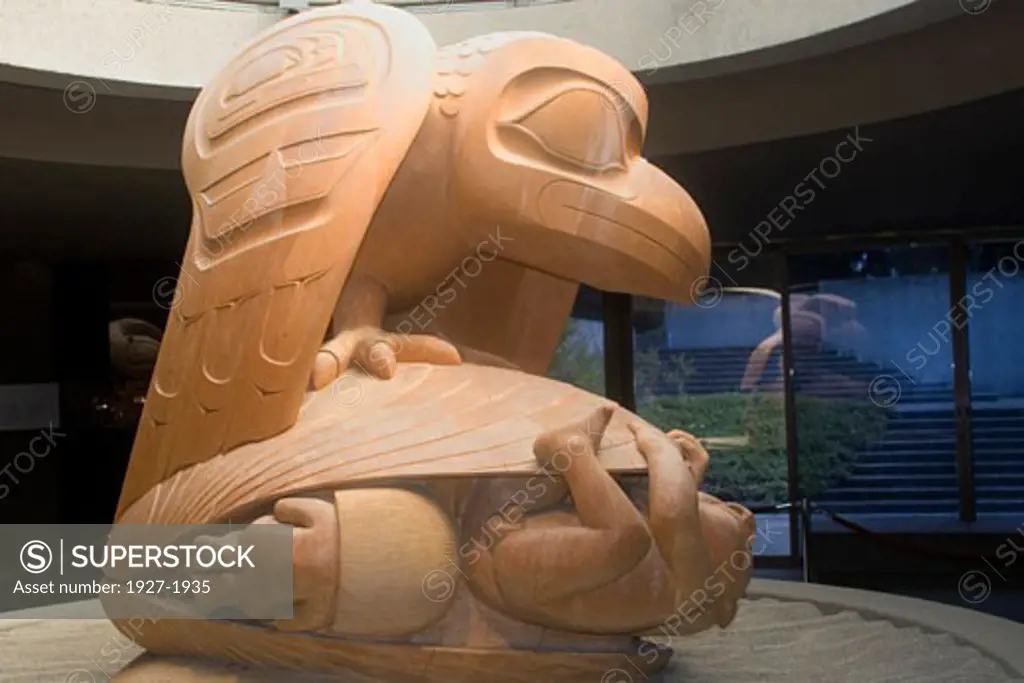 Raven and First Man by Bill Reid tells creation legand of Haida tribe - that Raven talked man out of his shell into this world  Statue appears on the Canada 20 bill Museum of Anthropology  Vancouver  Canada