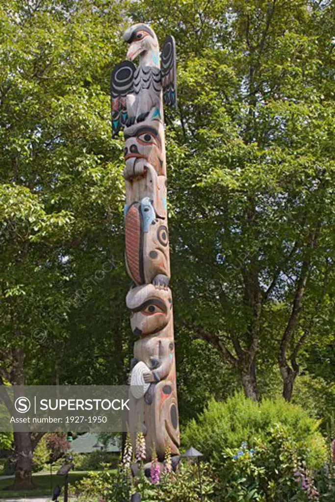 Totem Pole with Thunderbird on top Butchart GBardens  Vistoria  Canada