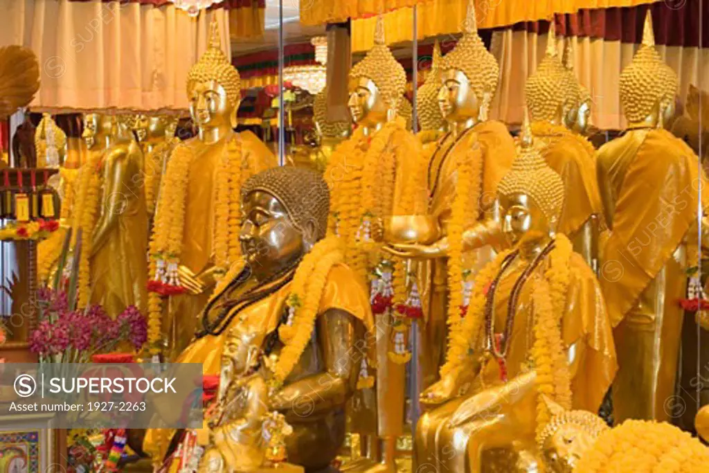 Images of Budda for sale in religious goods store Singapore