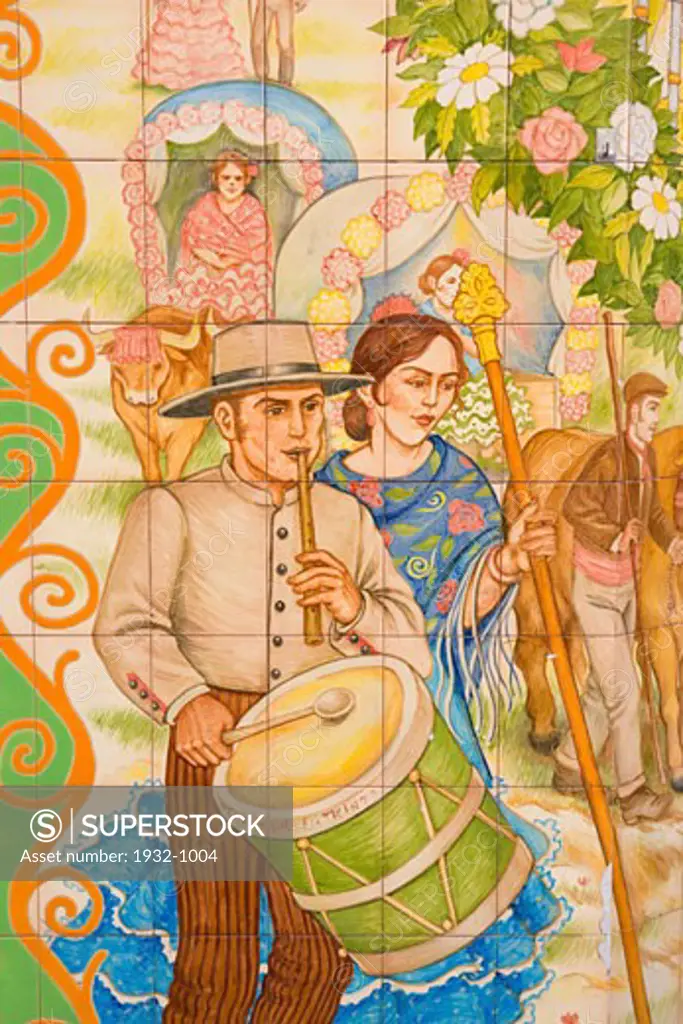 Ceramic tiled picture showing people in regional costume at romeria Malaga Spain