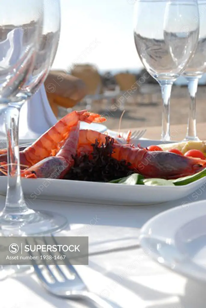 Salad made with shrimps and vegetables in popular beach restaurant Blue Marlin Ibiza Spain
