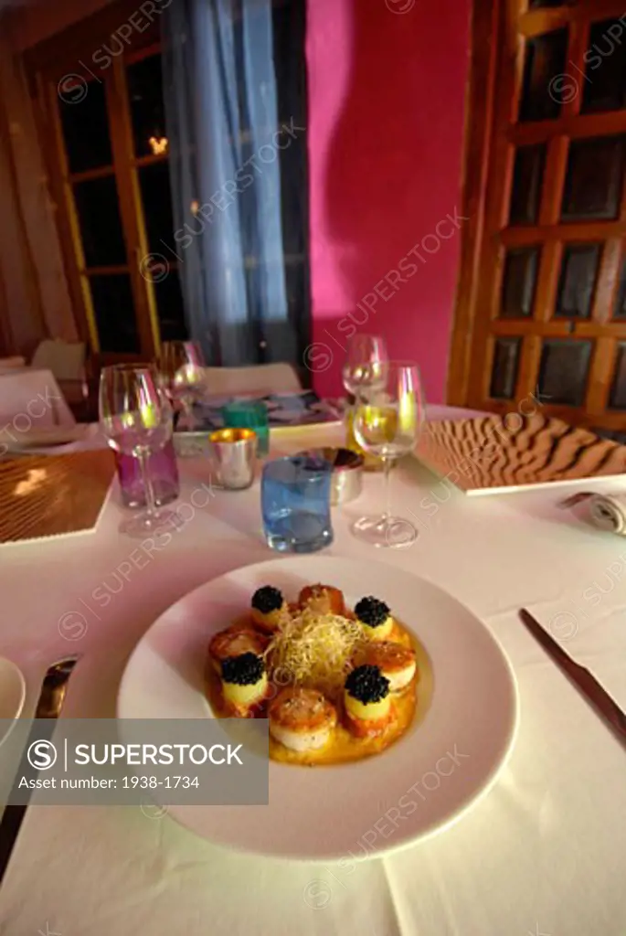 Tasty french cuisine plate in Can Domingo elegant restaurant Ibiza Spain
